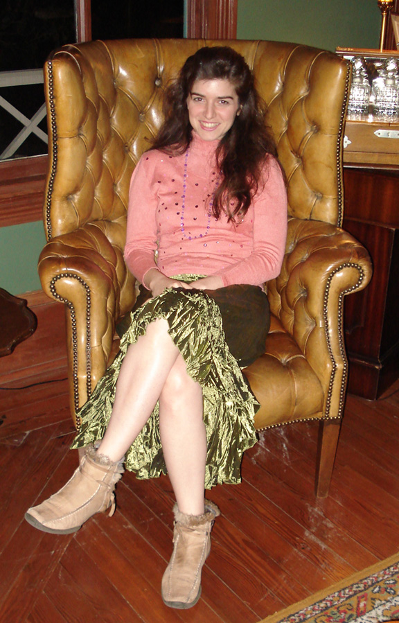 photo of Catherine Taormina in her refashioned cashmere sweater and a very nice chair